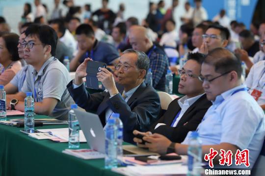 研討會現(xiàn)場圖?！■暮陚?攝