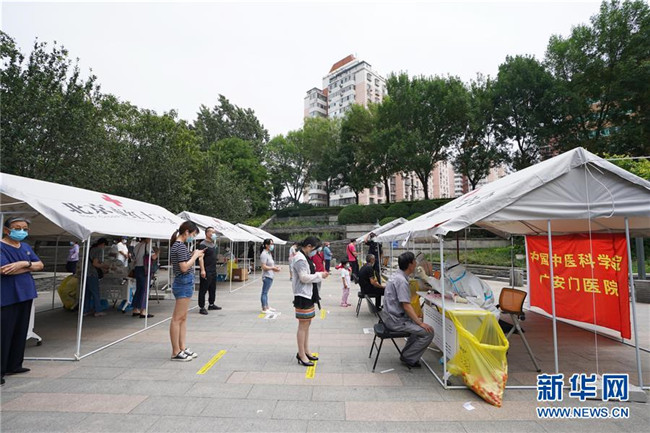 （新華全媒頭條·圖文互動）（5）首都再戰(zhàn)“疫”，難忘40天——寫在北京應(yīng)急響應(yīng)級別降級之際 